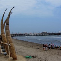 Reed boats on the beach of Huanchaco, few kilometers north of Trujillo